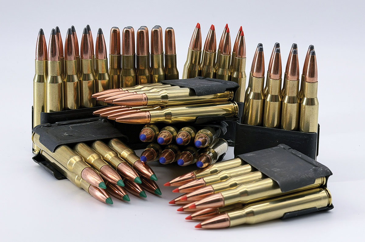 Lead core bullet handloads sit in their clips waiting to be tested at the range.